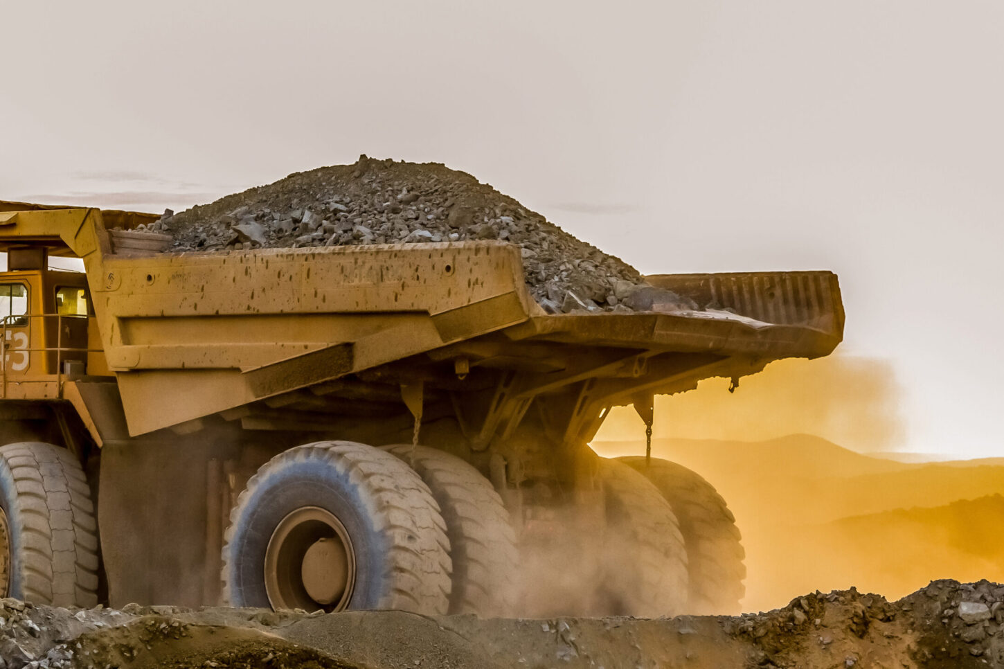 Large truck carrying sand on a platinum mining site in Africa
